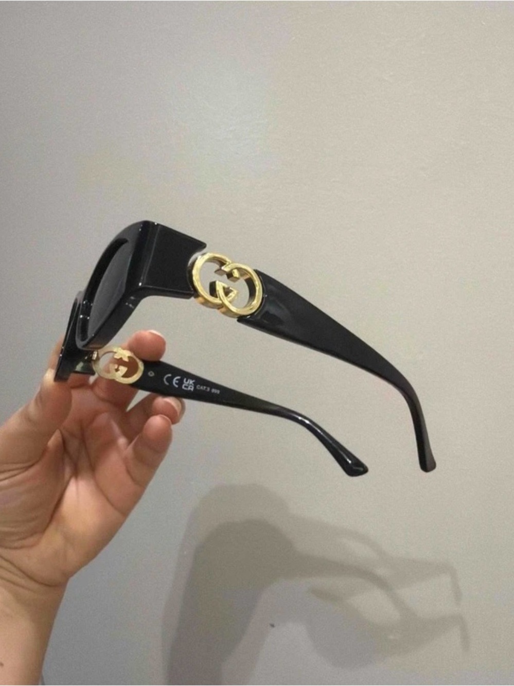 Gucci Black Sunglasses with Gold GG Emblem